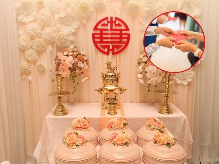 Cô dâu chú rể trong lễ đám hỏi truyền thống Việt Nam, nhận lời chúc phúc từ gia đình