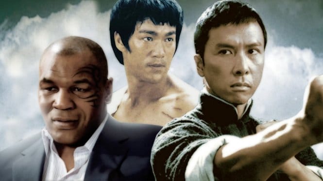 Chân Tử Đan và Mike Tyson trong cảnh đối đầu căng thẳng từ một bộ phim hành động, cho thấy sự kết hợp đỉnh cao của võ thuật và diễn xuất