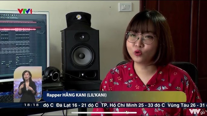 Chân dung Lil Kani, nữ rapper và chuyên gia giáo dục, với phong thái tự tin và chuyên nghiệp