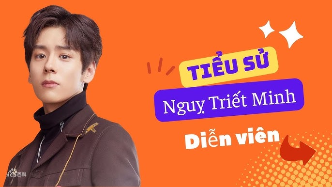 Minh Xù trong trang phục MC, thể hiện sự chuyên nghiệp và phong thái tự tin trên sân khấu